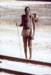 Dinka tribesman beside a railway track